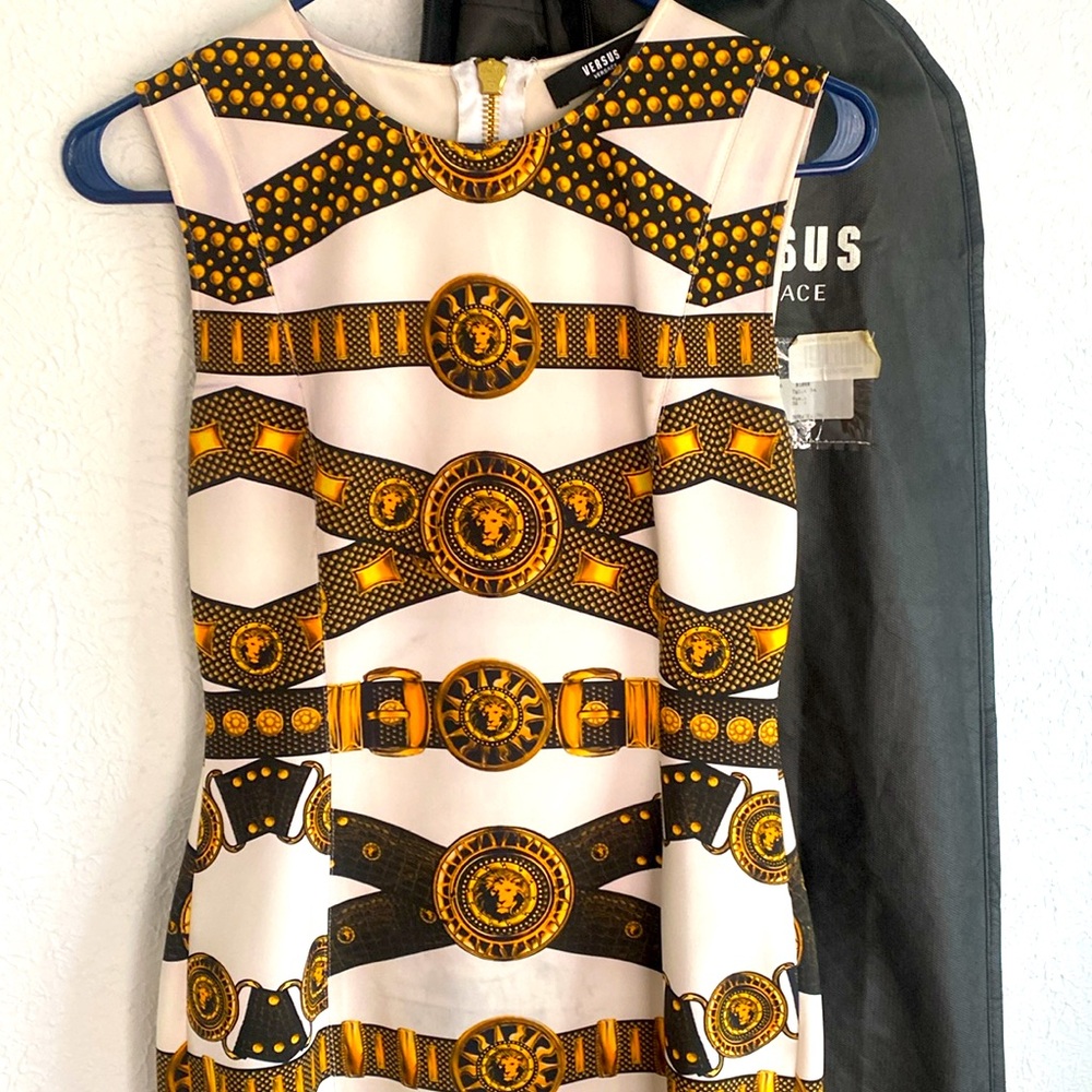 Versus by Versace Stunning sleeveless mini dress with gold hardware .